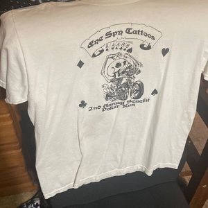 Lot of white motorcycle T’s